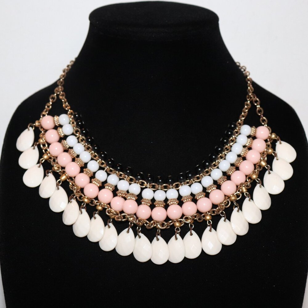 Beautiful gold, pink and white statement bib style beaded necklace 17-19"
